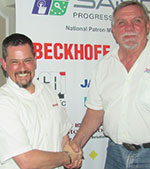 Hennie Prinsloo (right) thanks Kenneth M<sup>c</sup>Pherson after the presentation.
